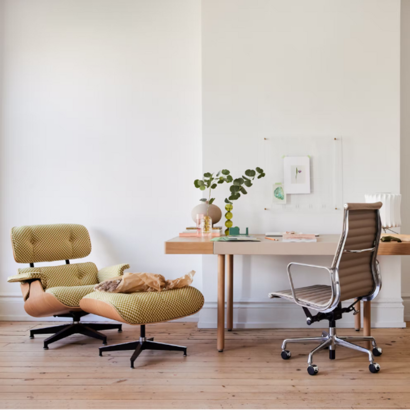 The Eames Lounge Chair and Ottoman from Herman Miller in a home office. all-groups
