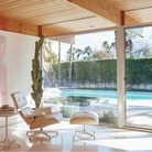 The Eames Lounge Chair and Ottoman from Herman Miller in a pool house. all-groups