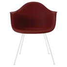 The brick red shell Eames Molded Plastic Armchair 4-Leg Base from Herman Miller with the white base.