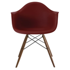 The brick red shell Eames Molded Plastic Armchair Dowel-Leg Base with the black base and walnut legs.