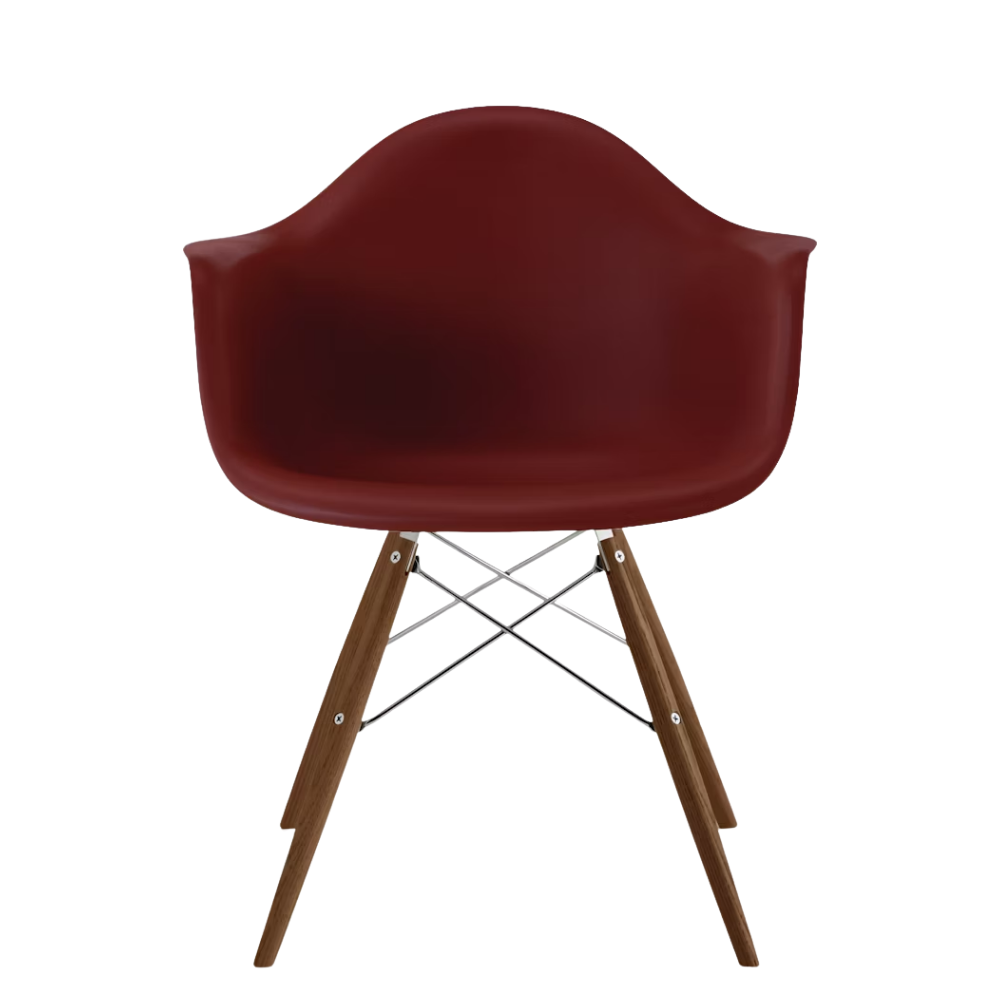 The brick red shell Eames Molded Plastic Armchair Dowel-Leg Base with the trivalent chrome base and walnut legs.