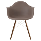 The cocoa shell Eames Molded Plastic Armchair Dowel-Leg Base with the white base and walnut legs.