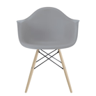 The light gray shell Eames Molded Plastic Armchair Dowel-Leg Base with the black base and white oak legs.