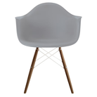 The light gray shell Eames Molded Plastic Armchair Dowel-Leg Base with the white base and walnut legs.