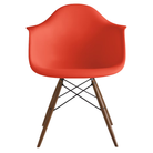 The red orange shell Eames Molded Plastic Armchair Dowel-Leg Base with the black base and walnut legs.