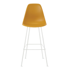 The deep yellow shell Eames Molded Plastic Bar Height Stool from Herman Miller with the white base.