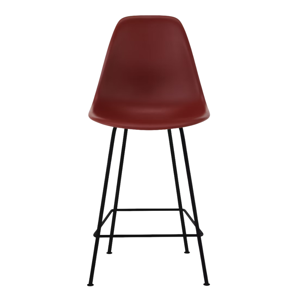 The brick red shell Eames Molded Plastic Counter Height Stool from Herman Miller with the black base.