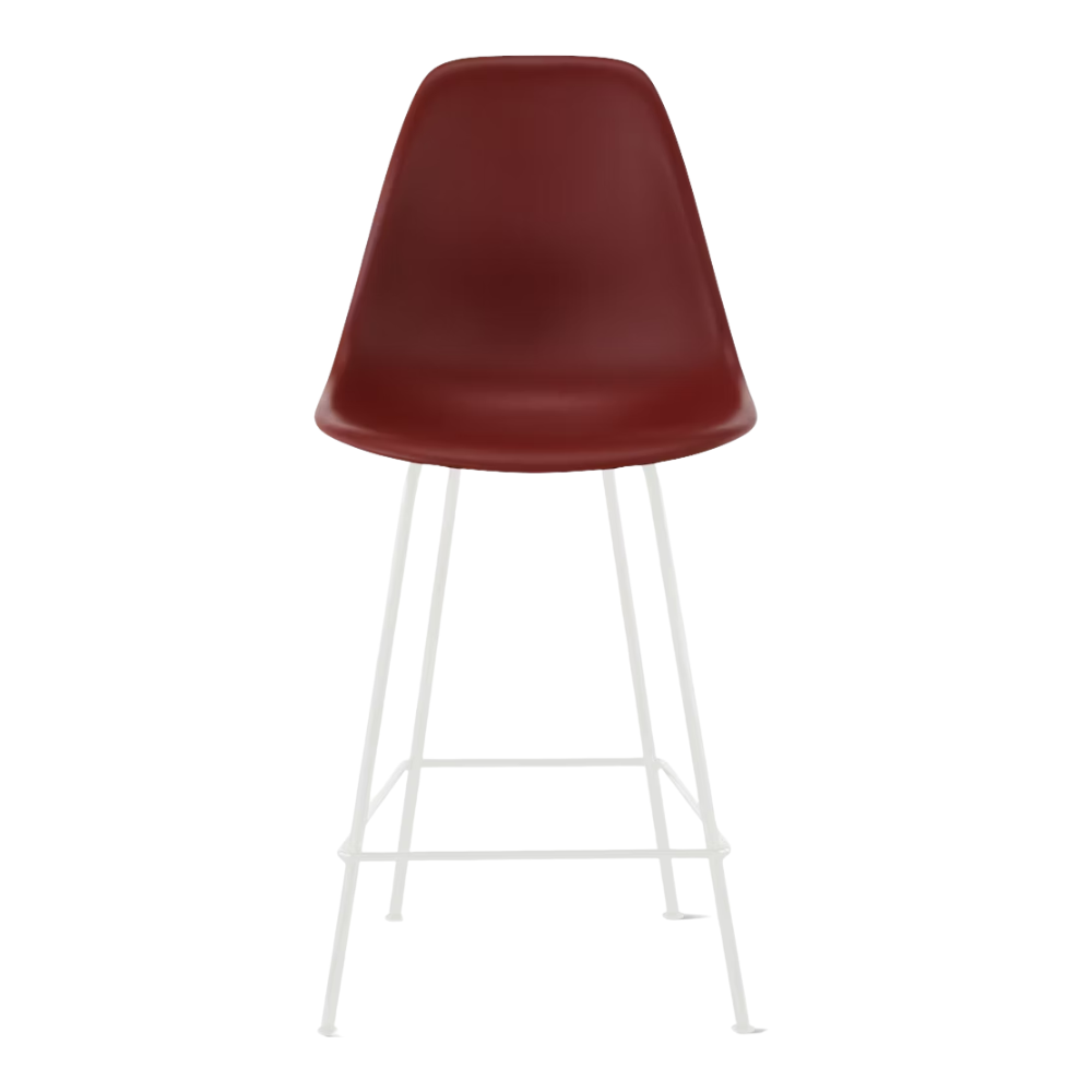 The brick red shell Eames Molded Plastic Counter Height Stool from Herman Miller with the white base.
