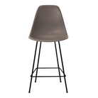 The cocoa shell Eames Molded Plastic Counter Height Stool from Herman Miller with the black base.