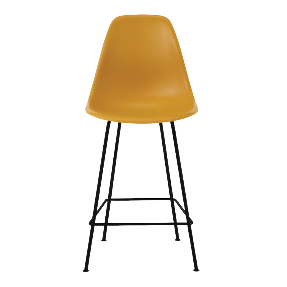 The deep yellow shell Eames Molded Plastic Counter Height Stool from Herman Miller with the black base.