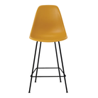 The deep yellow shell Eames Molded Plastic Counter Height Stool from Herman Miller with the black base.