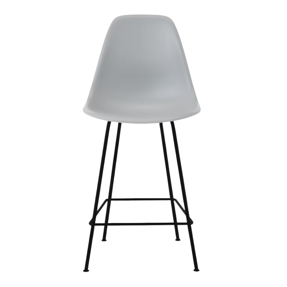 The light gray shell Eames Molded Plastic Counter Height Stool from Herman Miller with the black base.