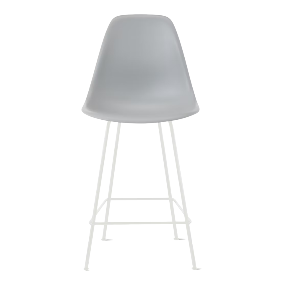 The light gray shell Eames Molded Plastic Counter Height Stool from Herman Miller with the white base.