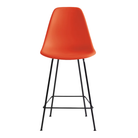 The red orange shell Eames Molded Plastic Counter Height Stool from Herman Miller with the black base.