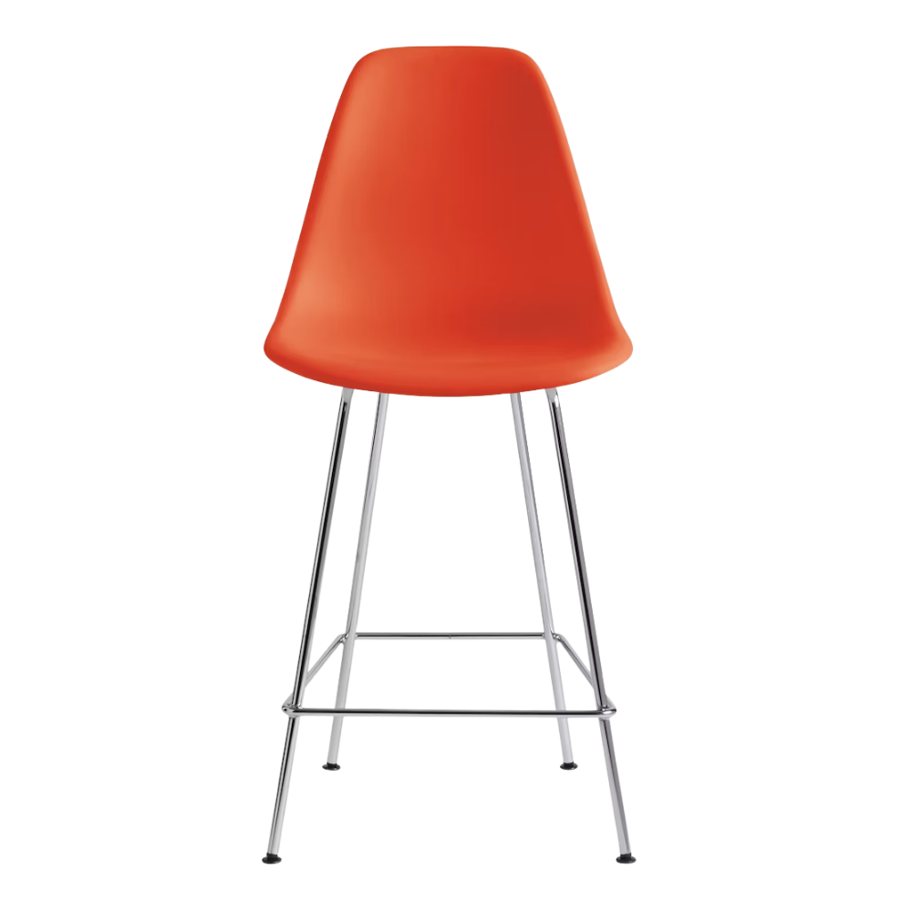 The red orange shell Eames Molded Plastic Counter Height Stool from Herman Miller with the trivalent chrome base.