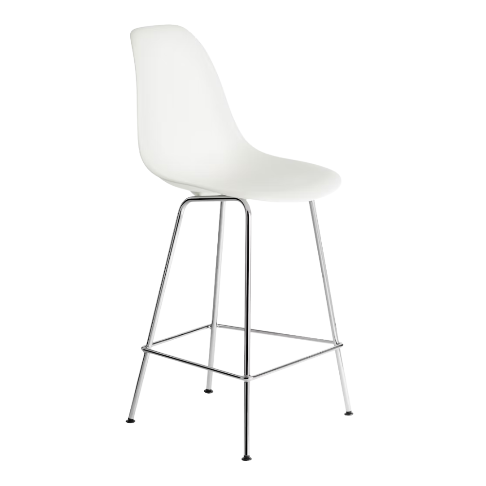 The white shell Eames Molded Plastic Counter Height Stool from Herman Miller with the trivalent chrome base from an angle.
