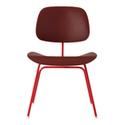 The Eames Molded Plastic Dining Chair from Herman Miller with the brick red shell and blaze leg finish from the front.