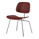 The Eames Molded Plastic Dining Chair from Herman Miller with the brick red shell and trivalent chrome leg finish.