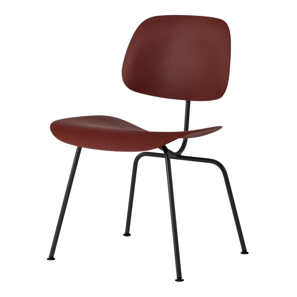 The Eames Molded Plastic Dining Chair from Herman Miller with the brick red shell and ultra black leg finish.