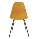 The deep yellow shell Eames Molded Plastic Side Chair 4-Leg Base from Herman Miller with the black base.