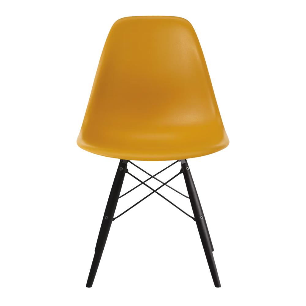 The deep yellow shell Eames Molded Plastic Side Chair Dowel-Leg Base from Herman Miller with the black base and ebony legs.