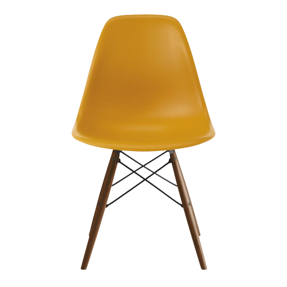 The deep yellow shell Eames Molded Plastic Side Chair Dowel-Leg Base from Herman Miller with the black base and walnut legs.
