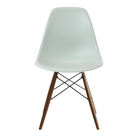 The gray green shell Eames Molded Plastic Side Chair Dowel-Leg Base from Herman Miller with the black base and walnut legs.