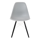 The light gray shell Eames Molded Plastic Side Chair Dowel-Leg Base from Herman Miller with the white base and ebony legs.