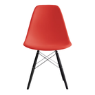 The red orange shell Eames Molded Plastic Side Chair Dowel-Leg Base from Herman Miller with the trivalent chrome base and ebony legs.