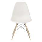 The white shell Eames Molded Plastic Side Chair Dowel-Leg Base from Herman Miller with the trivalent chrome base and white oak legs.