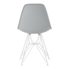The light gray shell Eames Molded Plastic Side Chair Wire Base from Herman Miller with white base from the back.