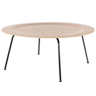 The Eames Molded Plywood Coffee Table Metal Base from Herman Miller with the white ash top and black base at an angle.