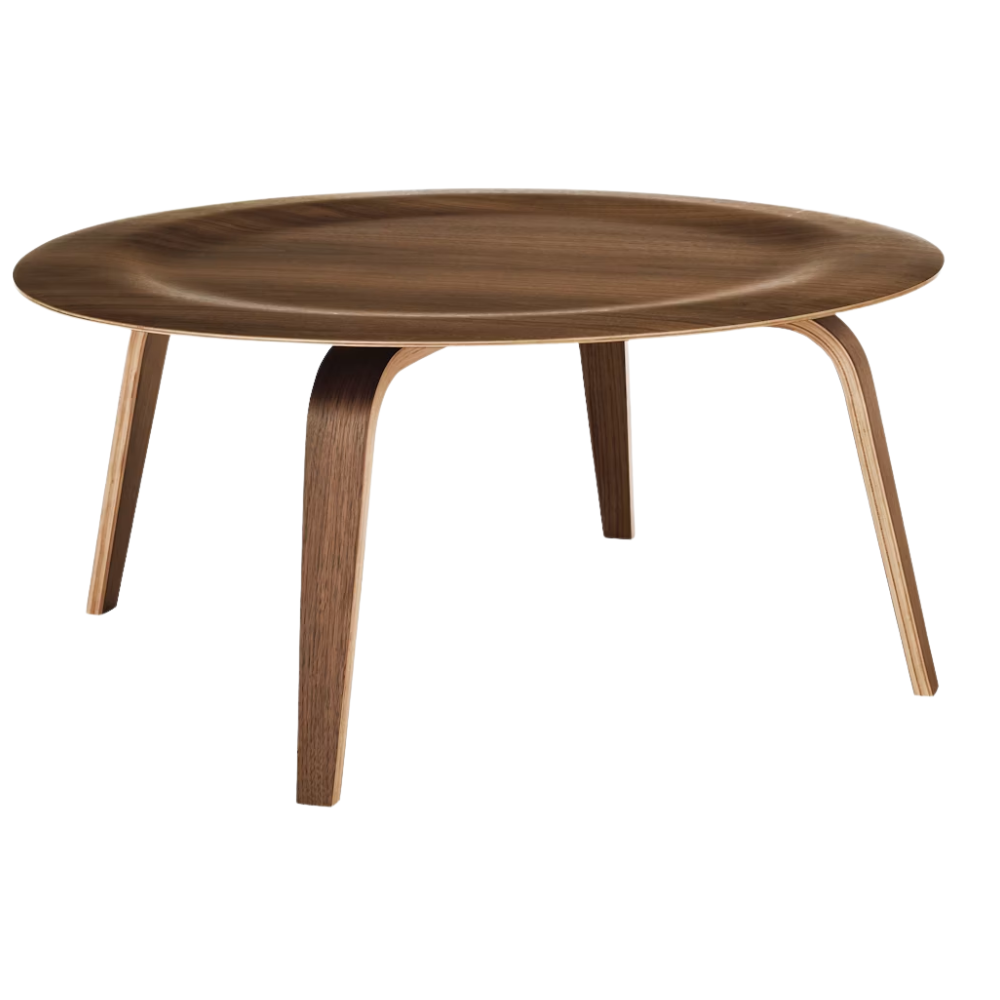 The walnut Eames Molded Plywood Coffee Table from Herman Miller.