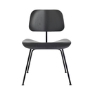 The Eames Molded Plywood Dining Chair Metal Base from Herman Miller with the ebony shell and black legs.