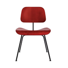The Eames Molded Plywood Dining Chair Metal Base from Herman Miller with the red stained birch shell and black legs.