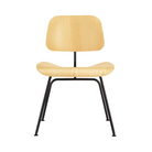 The Eames Molded Plywood Dining Chair Metal Base from Herman Miller with the white ash shell and black legs.