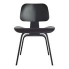The ebony Eames Molded Plywood Dining Chair Wood Base from Herman Miller.