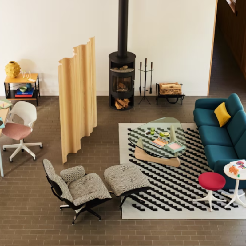 The Eames Molded Plywood Folding Screen from Herman Miller in a living room.