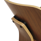 The Walnut Eames Molded Plywood Lounge Chair Wood Base from Herman Miller close up.