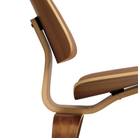 The Walnut Eames Molded Plywood Lounge Chair Wood Base from Herman Miller in detail.