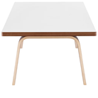The 22 by 48 inch white and walnut laminate Eames Rectangular Coffee Table from the side.