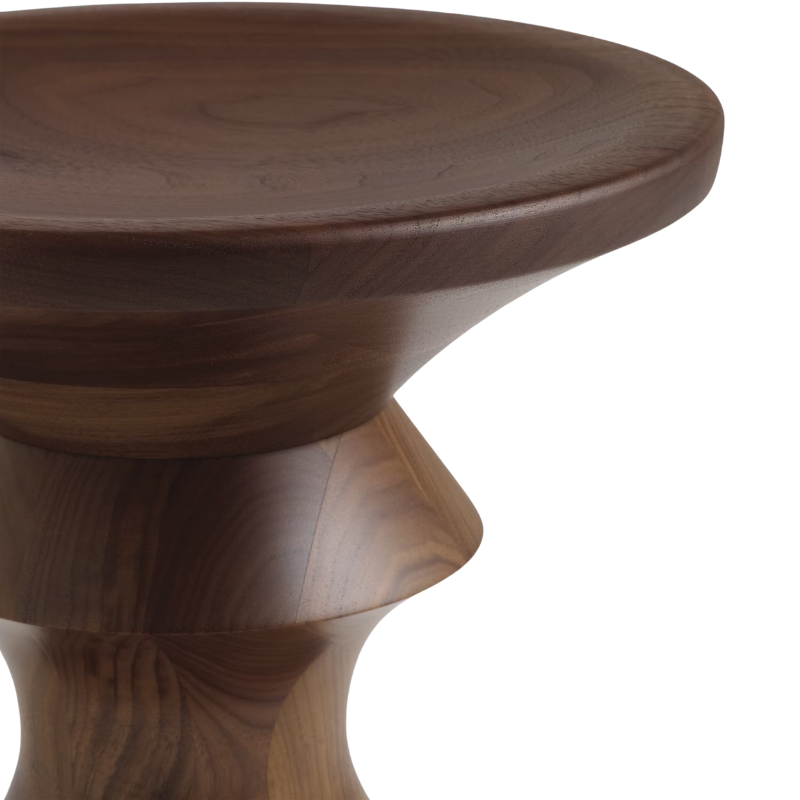 The Eames Turned Stool from Herman Miller in a close-up shot.