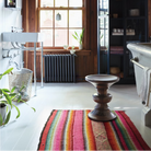 The Eames Turned Stool from Herman Miller in a lodge bathroom.