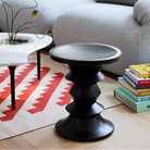 The Eames Turned Stool from Herman Miller in a lounge.