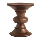 The Eames Turned Stool from Herman Miller made of walnut in shape B.