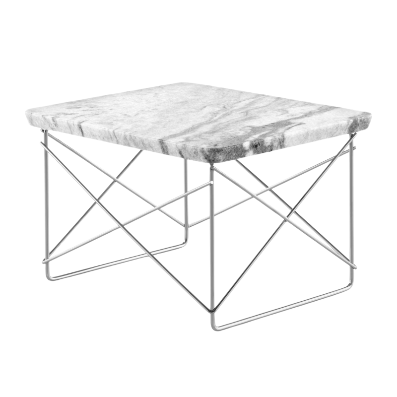 The Eames Wire Base Low Table from Herman Miller with the Georgia grey marble top and chrome base in a studio lifestyle photograph from an angle.