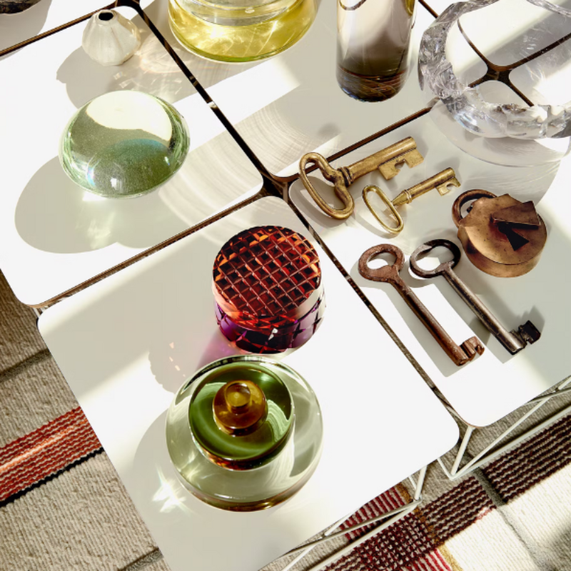 The Eames Wire Base Low Table from Herman Miller used to highlight decor accessories.