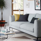 The Eames Wire Base Low Table from Herman Miller in a family space.