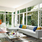 The Eames Wire Base Low Table from Herman Miller in a living area.