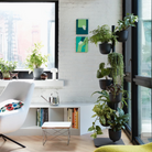 The Eames Wire Base Low Table from Herman Miller in a living room.